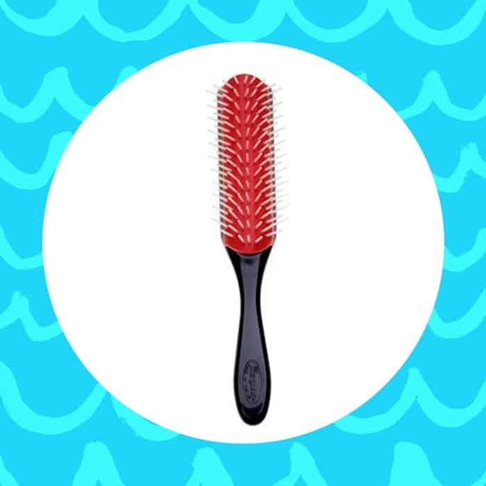 Denman brushes are some of the most popular detangling tools amongst us curlies. Turn on any natural hair tutorial, and it’s likely that the beauty guru is reaching for one. They’re credited often with giving your hair that extra definition you’re looking for.